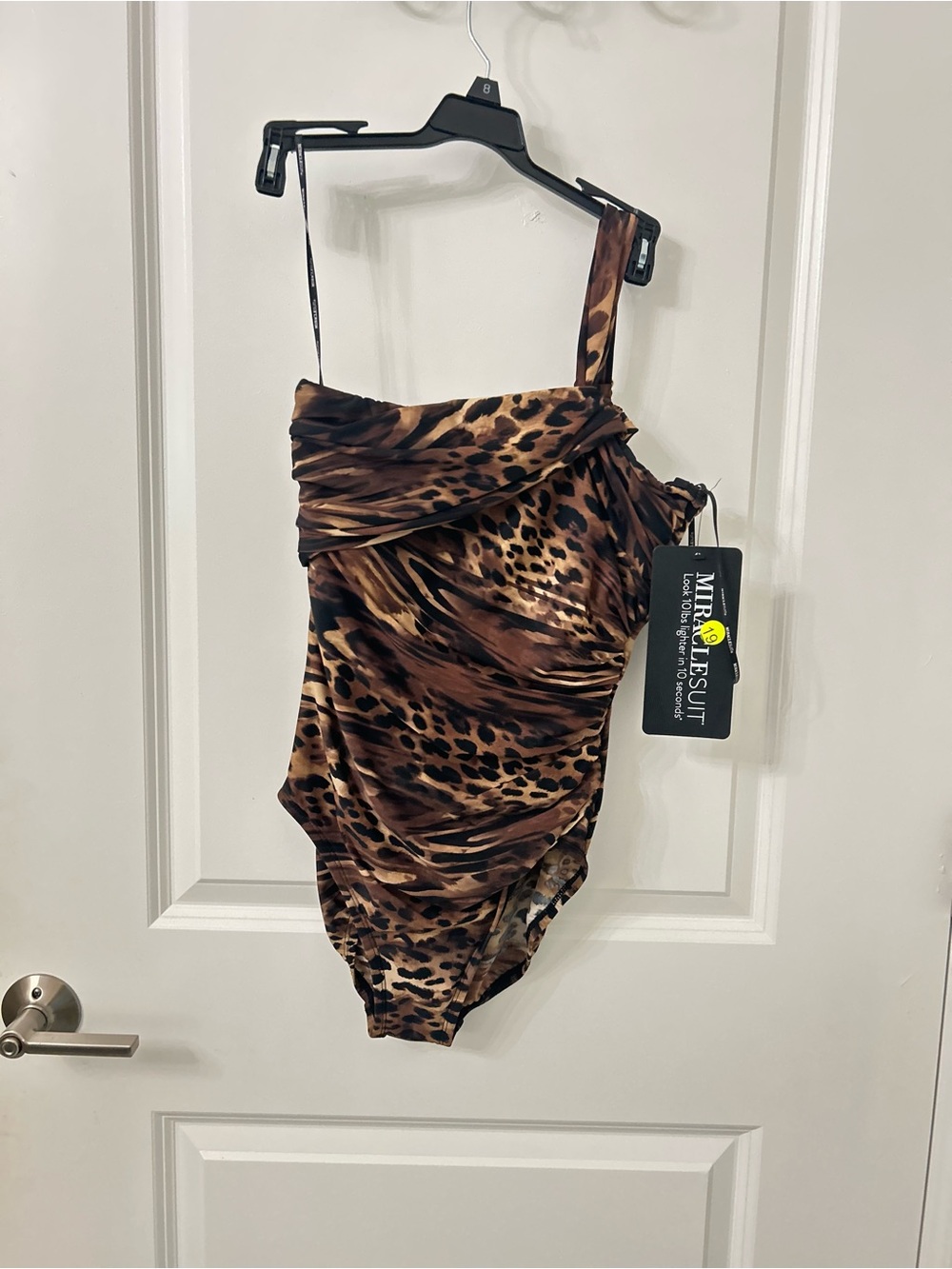 NWT Women’s Leopard Mirclesuit Size 8